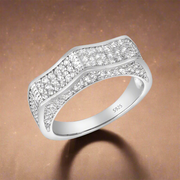 A 925 sterling silver ring with a humpy shape and eternity band, encrusted with cubic zirconia decorations.